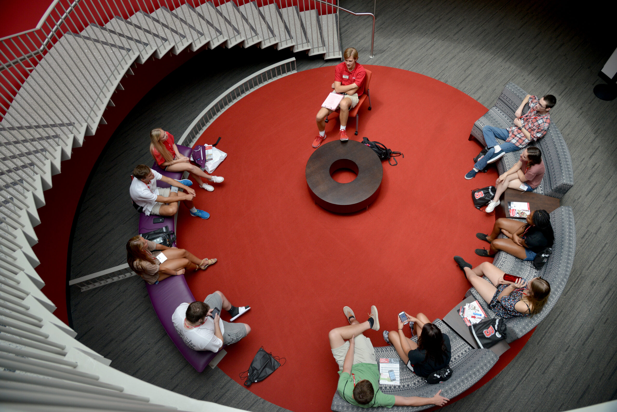 New students and orientation leaders chat in Talley Student Union during orientation.