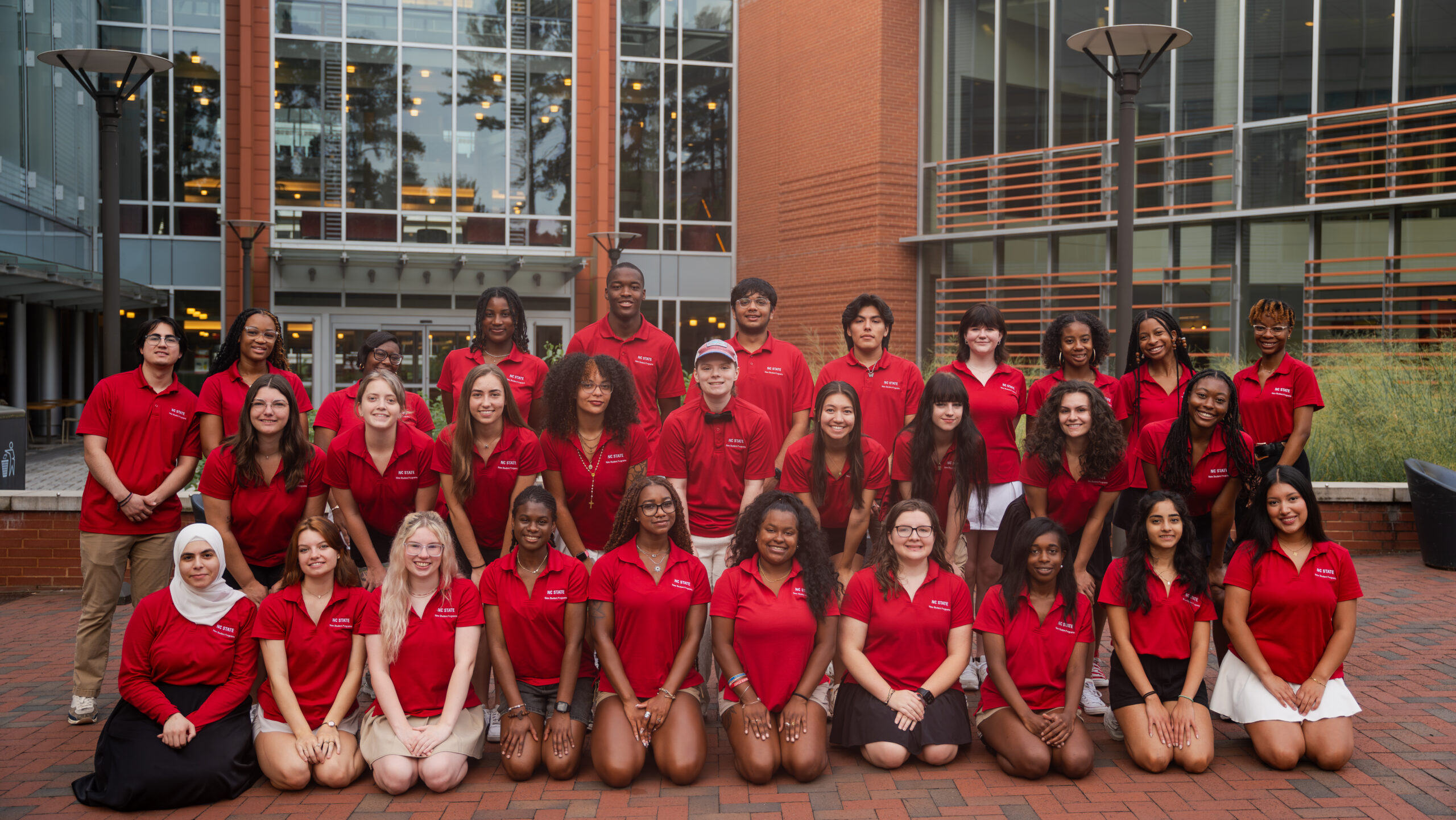 Group of orientation leaders in red polos